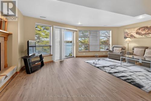 3037 Hilltop Lane, Frontenac (Frontenac South), ON - Indoor Photo Showing Living Room With Fireplace