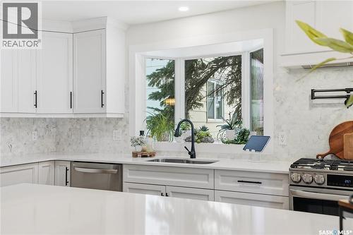 115 Whiteswan Drive, Saskatoon, SK - Indoor Photo Showing Kitchen With Double Sink With Upgraded Kitchen