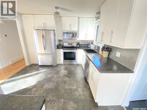 1205 Douglas Road, Weyburn, SK - Indoor Photo Showing Kitchen With Stainless Steel Kitchen With Double Sink