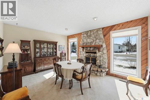 516 Wilken Crescent E, Warman, SK - Indoor With Fireplace