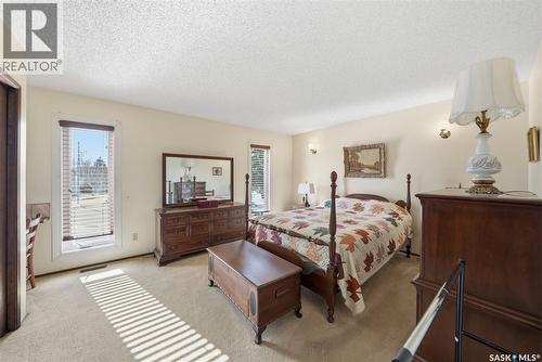 516 Wilken Crescent E, Warman, SK - Indoor Photo Showing Bedroom