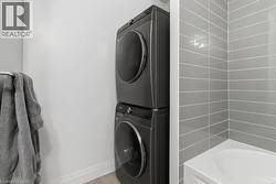 Stacked laundry appliances - 