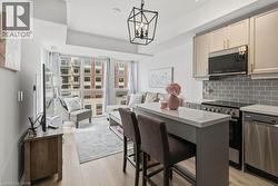 Open-concept living featuring expansive windows - 