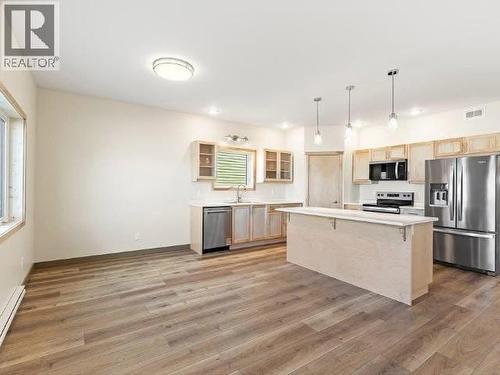 10 Alert Avenue, Whitehorse, YT - Indoor Photo Showing Kitchen With Stainless Steel Kitchen