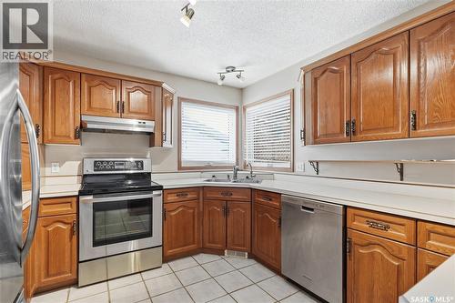 807 115Th Street E, Saskatoon, SK - Indoor Photo Showing Kitchen With Double Sink