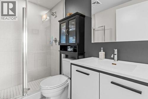 Bathroom featuring a stall shower and vanity - 385 Winston Road Unit# 1402, Grimsby, ON - Indoor Photo Showing Bathroom