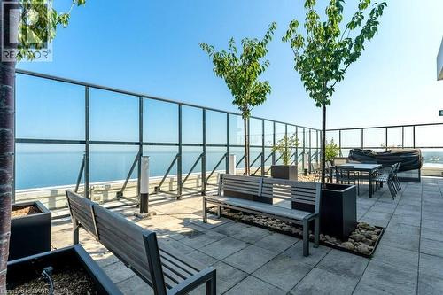 View of patio featuring a water view - 385 Winston Road Unit# 1402, Grimsby, ON -  With View