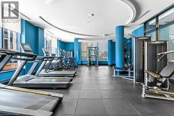 Gym featuring a wall of windows - 