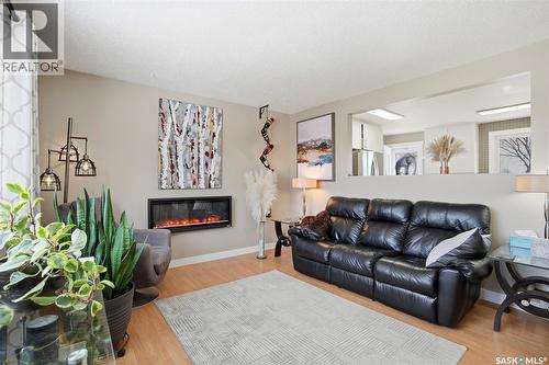 29 Tupper Crescent, Saskatoon, SK - Indoor Photo Showing Living Room With Fireplace