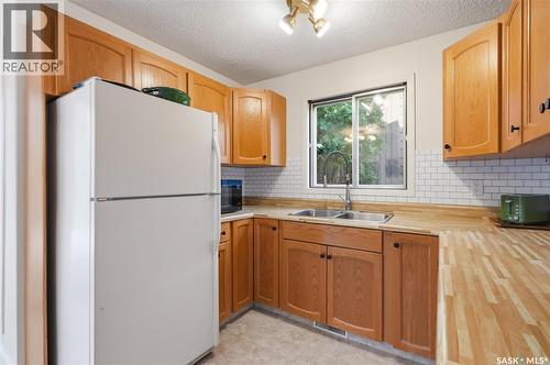 627 Delaronde Crescent, Saskatoon, SK - Indoor Photo Showing Kitchen With Double Sink