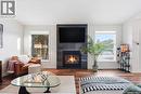 627 Delaronde Crescent, Saskatoon, SK  - Indoor Photo Showing Living Room With Fireplace 