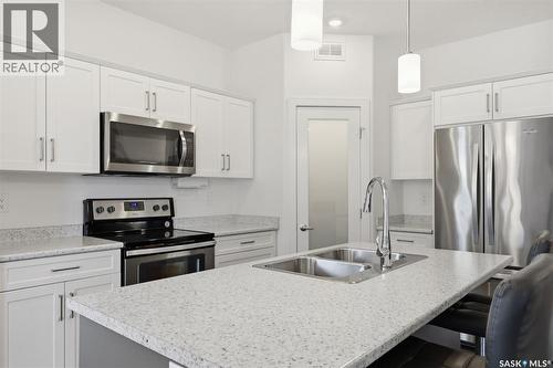 611 Kolynchuk Court, Saskatoon, SK - Indoor Photo Showing Kitchen With Double Sink With Upgraded Kitchen