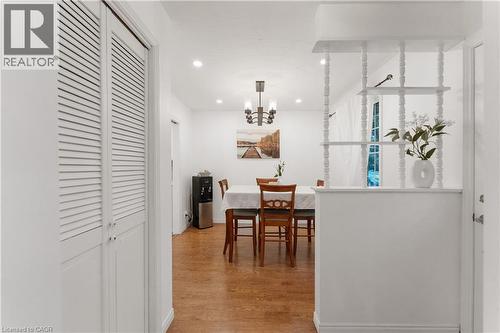 Dining space featuring light wood-style floors, recessed lighting, and a chandelier - 32 Donly Drive N, Simcoe, ON - Indoor