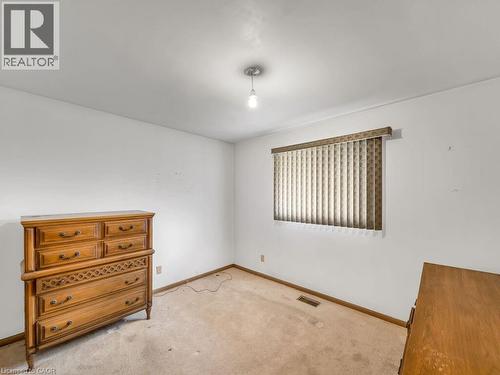 Room featuring white walls and wall-to-wall carpeting - 1416 Highway 6, Hamilton, ON - Indoor Photo Showing Other Room