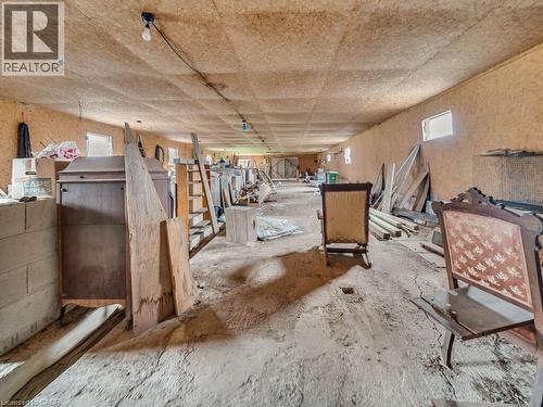 Expansive interior space with wood-finish paneling on walls and ceiling - 1416 Highway 6, Hamilton, ON - Indoor