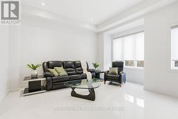 Bright living area, with large windows - 