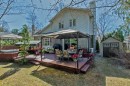 Back of Structure - 10 Place De Dieuze, Lorraine, QC  - Outdoor With Deck Patio Veranda 