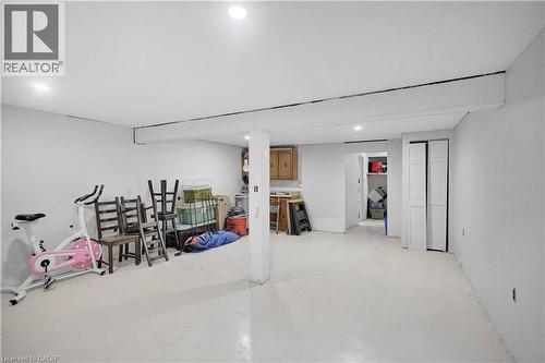 Finished basement area featuring light-toned flooring and recessed ceiling lighting - 32 Montclair Crescent, Simcoe, ON - Indoor
