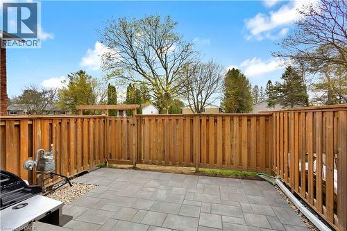 Paved patio area featuring large format pavers - 32 Montclair Crescent, Simcoe, ON - Outdoor