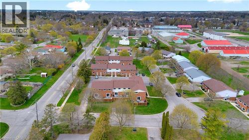 Aerial perspective highlighting a residential community with multi-unit dwellings - 32 Montclair Crescent, Simcoe, ON - Outdoor With View