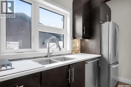 305 Clarence Avenue S, Saskatoon, SK - Indoor Photo Showing Kitchen With Double Sink With Upgraded Kitchen