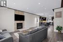 305 Clarence Avenue S, Saskatoon, SK  - Indoor Photo Showing Living Room With Fireplace 