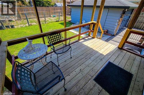 Outdoor wood-finish deck with wooden railings - 103 East 45Th Street, Hamilton, ON - Outdoor With Deck Patio Veranda With Exterior