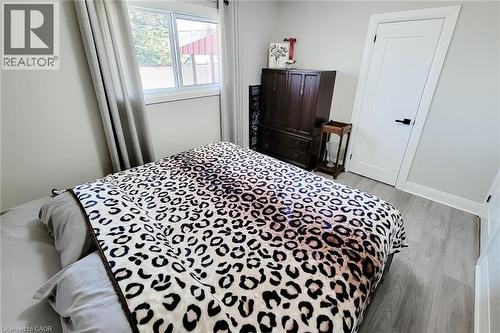 Room featuring light gray walls and wood-finish flooring - 103 East 45Th Street, Hamilton, ON - Indoor Photo Showing Bedroom