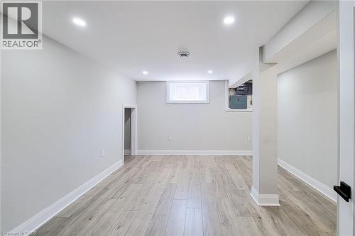 Spacious interior featuring light wood-finish flooring, recessed lighting, and a white trim package - 103 East 45Th Street, Hamilton, ON - Indoor