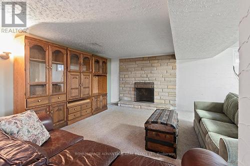 10 Robert Road, Perth, ON - Indoor Photo Showing Living Room With Fireplace