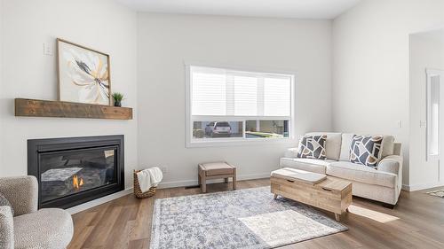9-405 Canyon Street, Creston, BC - Indoor Photo Showing Living Room With Fireplace