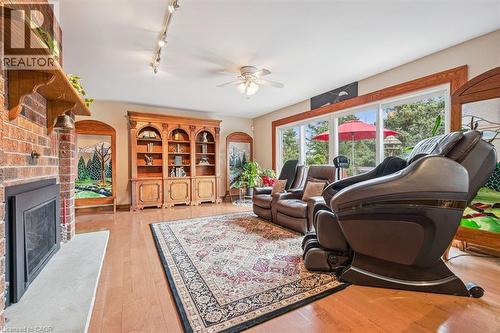 5792 8Th Line E, Ariss, ON - Indoor Photo Showing Living Room With Fireplace