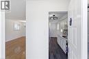 Entryway featuring a white paneled door with a decorative knocker - 341 Rexford Drive, Hamilton, ON  - Indoor 