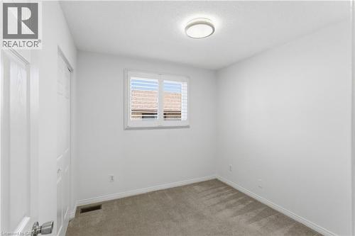 Room with white walls and grey carpet flooring - 341 Rexford Drive, Hamilton, ON - Indoor Photo Showing Other Room