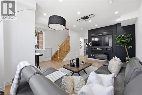 Open-concept living area featuring light wood-finish flooring - 9 Rabbit Run Way, Brampton, ON - Indoor Photo Showing Living Room