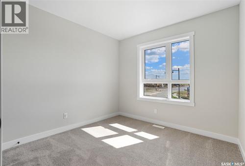 42 Taskamanwa Terrace, Saskatoon, SK - Indoor Photo Showing Other Room