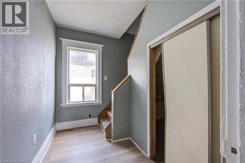 First set of Stairs to upper level and storage below stairs - 1 Rathgar Street, London, ON - Indoor Photo Showing Other Room