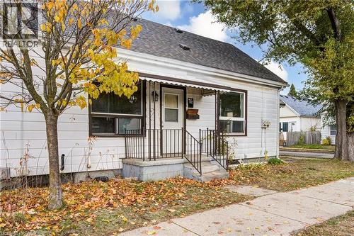 White siding exterior with a dark shingle roof - 1 Rathgar Street, London, ON - Outdoor