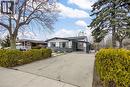 Contemporary residence featuring a black-trimmed roofline and a stone facade - 85 Ranchdale Drive, Hamilton, ON  - Outdoor 