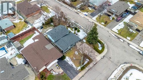 Residential property featuring a dark shingle roof and an asphalt driveway - 85 Ranchdale Drive, Hamilton, ON - 