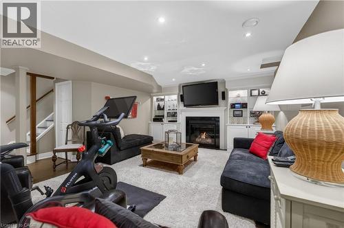 4266 Clubview Drive, Burlington, ON - Indoor Photo Showing Gym Room With Fireplace