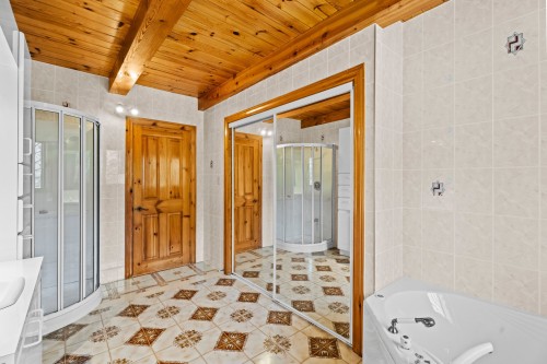 Salle de bains attenante à la CCP - 131 Rue Des Bouleaux, Entrelacs, QC - Indoor Photo Showing Bathroom