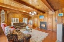 Salon - 131 Rue Des Bouleaux, Entrelacs, QC  - Indoor Photo Showing Living Room With Fireplace 