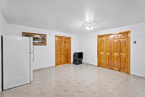 Salle familiale - 131 Rue Des Bouleaux, Entrelacs, QC - Indoor Photo Showing Other Room