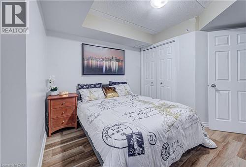 1490 Bishops Gate Unit# 106, Oakville, ON - Indoor Photo Showing Bedroom