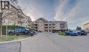 1490 Bishops Gate Unit# 106, Oakville, ON  - Outdoor With Facade 