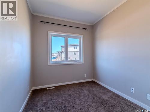 102 720 Baltzan Boulevard, Saskatoon, SK - Indoor Photo Showing Other Room