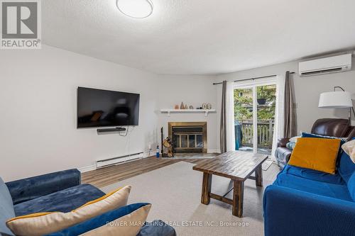 160 Rushford Private, Ottawa, ON - Indoor Photo Showing Living Room With Fireplace