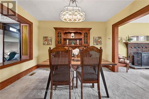 257 Queensdale Avenue E, Hamilton, ON - Indoor With Fireplace