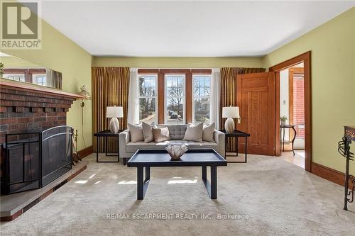257 Queensdale Avenue E, Hamilton, ON - Indoor Photo Showing Living Room With Fireplace